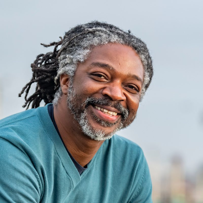 Kevan Smith, founder of Epiphany Content, laughing on a rooftop